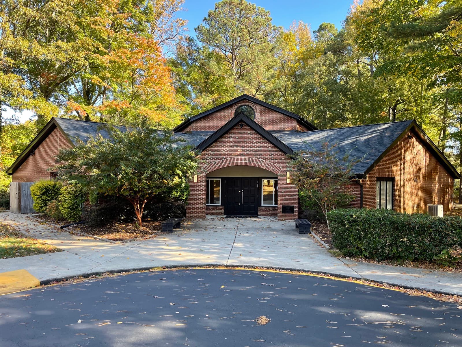 The Sha'arei Shalom campus at 700 Old Apex Road in Cary, NC, surrounded by autumn trees